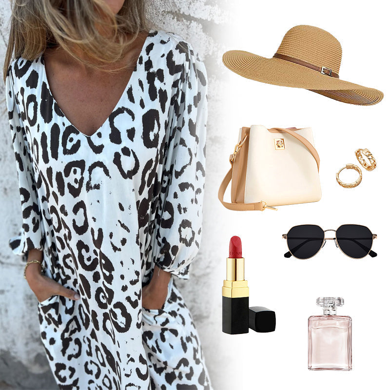 JOLY | Robe fluide avec décolleté en V et poches.