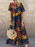 Calista - Bold Botanical Print Flowing Midi Dress